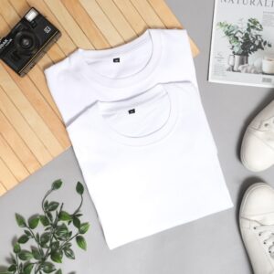 Photo by Mediamodifier white crew neck shirt on white and green floral textile