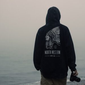 person facing body of water