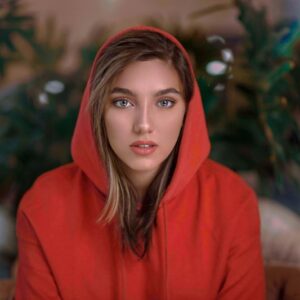 woman in red hoodie standing